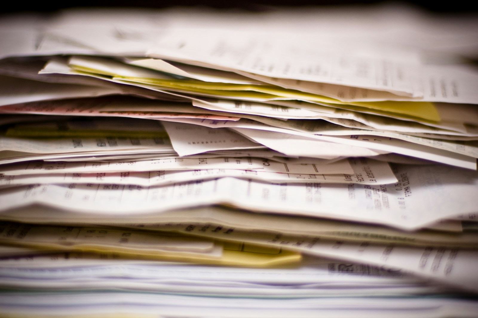A close-up of a stack of papers.